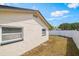Spacious backyard featuring a white fence, providing privacy and security for outdoor activities at 725 Laurel Way, Casselberry, FL 32707