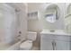 Classic bathroom with tiled shower-tub combo and white vanity at 725 Laurel Way, Casselberry, FL 32707