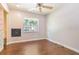 Bedroom featuring wood-look flooring, natural light and closet space at 725 Laurel Way, Casselberry, FL 32707