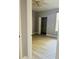 Bedroom features neutral walls, closet, ceiling fan, tile flooring, and plenty of natural light at 860 N Orange Ave # 460, Orlando, FL 32801