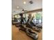 Community gym with treadmills, elliptical machines, fans, and views of the pool at 860 N Orange Ave # 460, Orlando, FL 32801