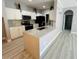 Modern kitchen boasts granite countertops, stainless steel appliances, and ample cabinet space for storage at 860 N Orange Ave # 460, Orlando, FL 32801