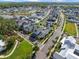 Spacious property aerial view near a neighborhood park, pond, with beautiful walking trail and sidewalks at 921 Bradenville Ln, Winter Garden, FL 34787
