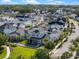 Aerial view of an upscale neighborhood with a mix of architectural styles and mature landscaping at 921 Bradenville Ln, Winter Garden, FL 34787