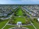 Aerial view of a community with central green space, connecting homes and gathering places at 921 Bradenville Ln, Winter Garden, FL 34787