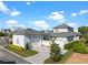 Long driveway featuring two garages and a private gated drive. Beautiful landscaping at 921 Bradenville Ln, Winter Garden, FL 34787