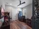 Relaxing game room featuring an arcade machine, comfortable recliners, and a TV at 921 Bradenville Ln, Winter Garden, FL 34787