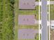 Aerial view of several homes with well-maintained lawns in a suburban neighborhood at 1511 Lyonsdale Ln, Sanford, FL 32771