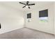 Bright bedroom features neutral walls, carpeted floor, and window with black shades providing natural light at 1511 Lyonsdale Ln, Sanford, FL 32771