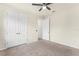 Spacious carpeted bedroom with closet and neutral walls, offering ample space for relaxation at 1511 Lyonsdale Ln, Sanford, FL 32771