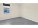 A carpeted bedroom with window with black shade providing natural light at 1511 Lyonsdale Ln, Sanford, FL 32771