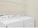The laundry room features a Whirlpool washer and dryer at 1511 Lyonsdale Ln, Sanford, FL 32771
