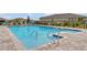 Community pool featuring a wading area with a railing at 1511 Lyonsdale Ln, Sanford, FL 32771