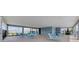Covered common area with tables and seating surrounds an outdoor pool at 1511 Lyonsdale Ln, Sanford, FL 32771