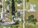 Overhead view shows home on canal with community pool and access to nearby lake at 5208 Oakdale Rd, Haines City, FL 33844