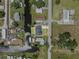 Overhead view shows home on canal with community pool and access to nearby lake at 5208 Oakdale Rd, Haines City, FL 33844