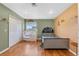 Comfortable bedroom featuring a twin bed, day bed, closet and neutral walls at 5208 Oakdale Rd, Haines City, FL 33844