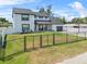 Beautiful home with a fenced yard and a driveway, offering security and curb appeal at 5208 Oakdale Rd, Haines City, FL 33844