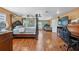 Large main bedroom features a four poster bed, en-suite bathroom, and ample space at 5208 Oakdale Rd, Haines City, FL 33844