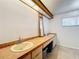 Bright bathroom features double sinks, updated vanity, tile floors, and a large mirror at 1007 Gammage Pt, Oviedo, FL 32765