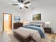 Comfortable bedroom featuring a plush bed, neutral tones, and serene wall art at 1007 Gammage Pt, Oviedo, FL 32765