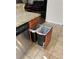 This kitchen has modern conveniences such as a slide-out double trash bin for easy disposal at 1034 Weathered Wood Cir, Winter Springs, FL 32708