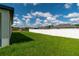 The expansive backyard is lush and green, fully fenced, and is ready to enjoy outdoor living at 12950 Sw 38Th Cir, Ocala, FL 34473