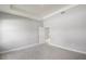 Bright primary bedroom featuring carpet and tray ceiling at 12950 Sw 38Th Cir, Ocala, FL 34473