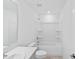 Bathroom featuring a tub/shower combination and white fixtures at 174 River Front Way, Edgewater, FL 32141