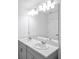 Bathroom featuring double sinks with plenty of counter space at 174 River Front Way, Edgewater, FL 32141
