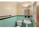 Bathroom featuring classic tile work and pedestal sink at 1825 Baldwin Dr, Orlando, FL 32806