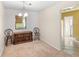 Dining room features a vintage cabinet and chairs, connecting to the kitchen and hallway at 1825 Baldwin Dr, Orlando, FL 32806