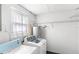 Laundry room with new washer and dryer units and ample storage space at 1825 Baldwin Dr, Orlando, FL 32806
