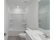 Bathroom with white bathtub, shower combo, toilet and vanity at 184 River Front Way, Edgewater, FL 32141