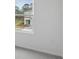 Bedroom with gray carpet and a window view of the exterior at 184 River Front Way, Edgewater, FL 32141