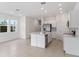 Kitchen with island and stainless steel appliances at 184 River Front Way, Edgewater, FL 32141