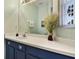 Well-lit bathroom vanity with elegant fixtures and decorative details at 8487 Crystal Cove Loop, Kissimmee, FL 34747