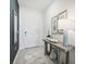 Inviting entryway featuring tile flooring, modern decor, and a stylish console table with decorative accents at 10132 Huntingnet Way, Leesburg, FL 34748