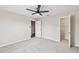 Bright bedroom boasts new carpet, ceiling fan, and a closet at 1028 Sadie Ridge Rd, Clermont, FL 34715