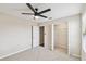 Neutral bedroom offering new carpet, ceiling fan, closet, and bright natural light at 1028 Sadie Ridge Rd, Clermont, FL 34715