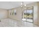 Open dining area with sliding glass doors to outdoor patio at 1028 Sadie Ridge Rd, Clermont, FL 34715