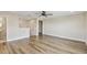 Open living room area featuring wood flooring, recessed lighting, and neutral paint at 1028 Sadie Ridge Rd, Clermont, FL 34715
