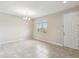 Living room featuring tile floors, neutral walls, chandelier and natural light at 1028 Sadie Ridge Rd, Clermont, FL 34715