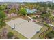 Aerial view of a well-maintained sand volleyball court, perfect for fun and active community engagement at 1028 Sadie Ridge Rd, Clermont, FL 34715