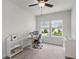 Bedroom with office setup, shelving, and a changing table at 1052 Avila Ln, Orlando, FL 32803