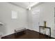 Bright entryway with hardwood floors, bench seating, and modern decor at 1052 Avila Ln, Orlando, FL 32803