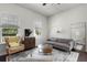 Inviting living room features hardwood floors, stylish furniture, and ample natural light at 1052 Avila Ln, Orlando, FL 32803