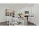 Spacious kitchen with stainless steel appliances, a central island, and pendant lighting at 1078 Clay Blvd, Tavares, FL 32778