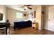 Comfortable bedroom features natural lighting, ceiling fan, and hard surface floors at 111 Palencia Rd, Auburndale, FL 33823