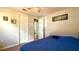 Inviting bedroom provides a tranquil space with a ceiling fan, closet, and hard surface floors at 111 Palencia Rd, Auburndale, FL 33823